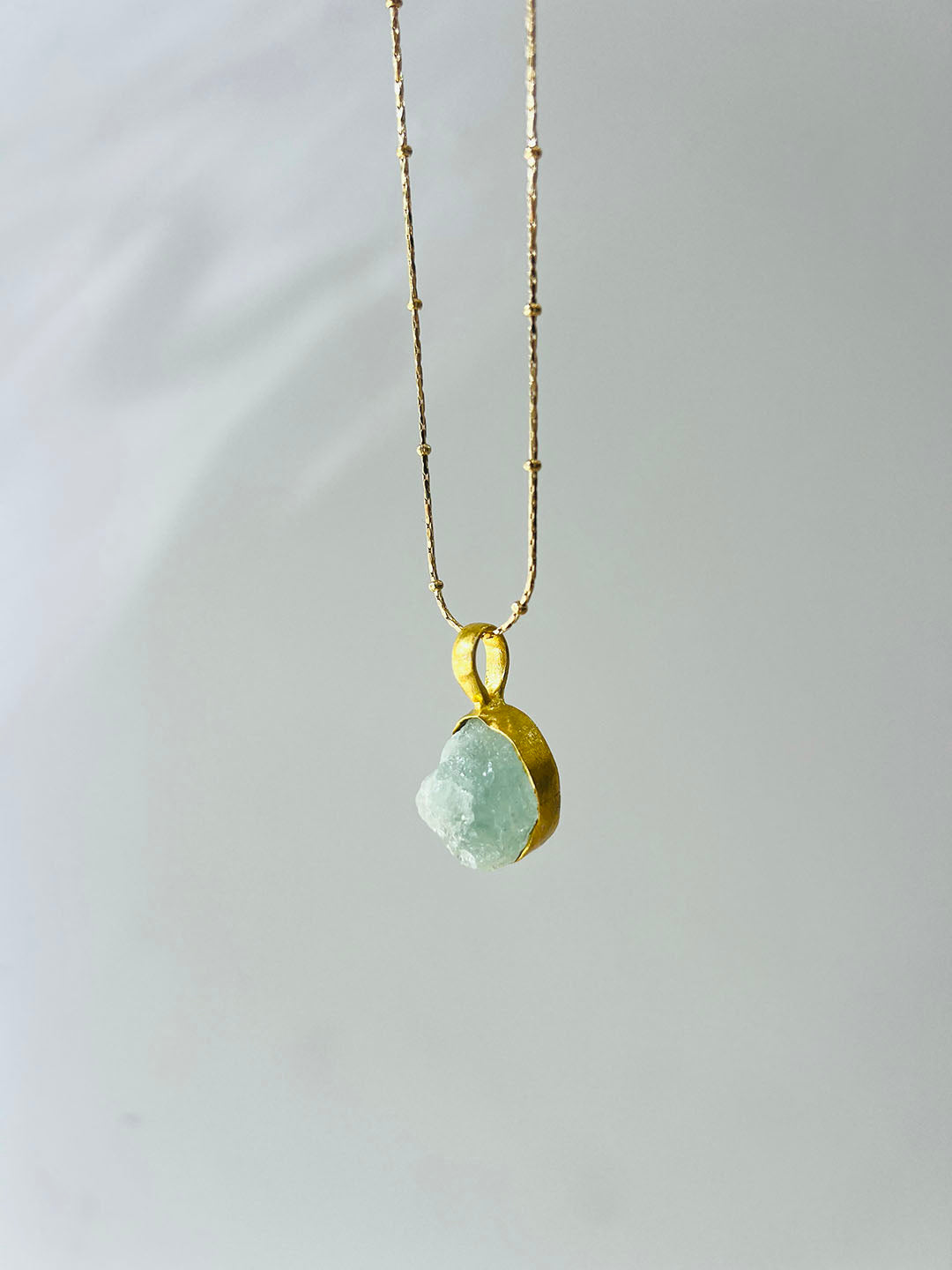 Golden Aura Necklace in Aquamarine