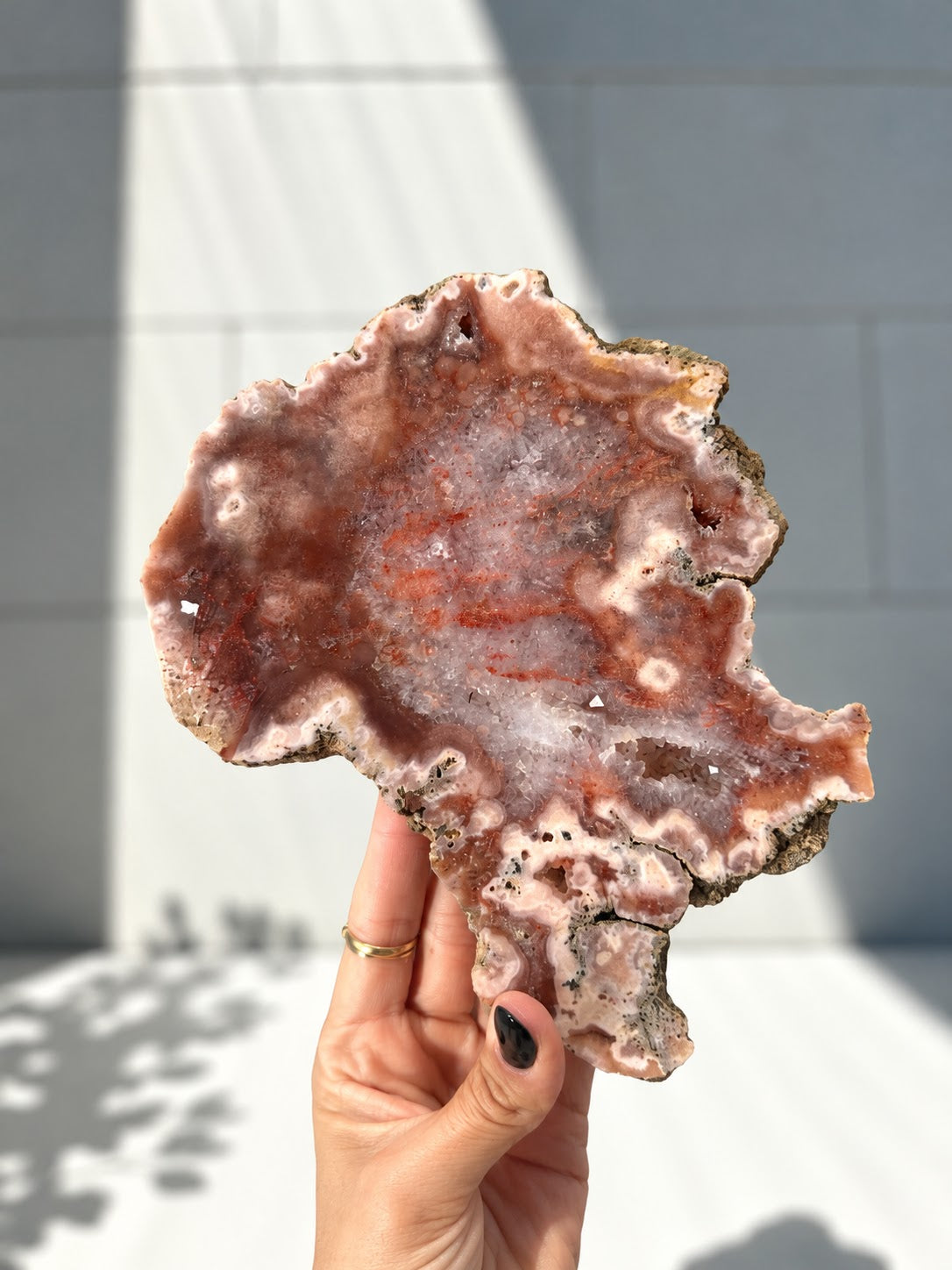 Pink Amethyst Slab held in hand