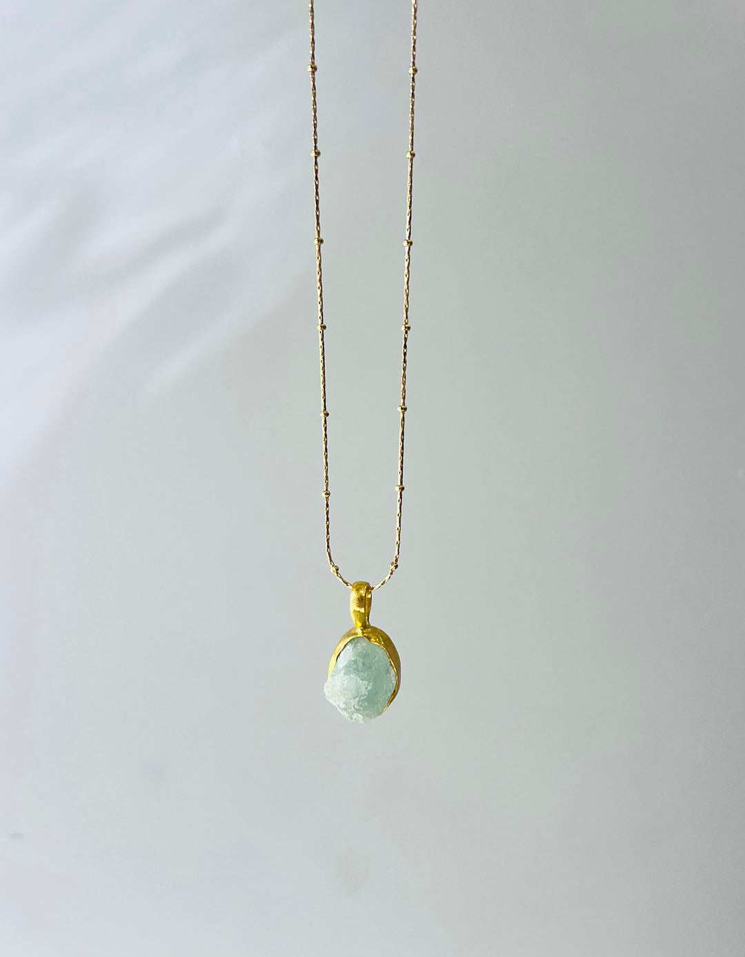 Golden Aura Necklace in Aquamarine